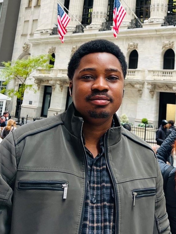 Muiz Olasupo outside the New York Stock Exchange